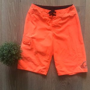 Bright orange Quiksilver Board Shorts with 24 inch waist
